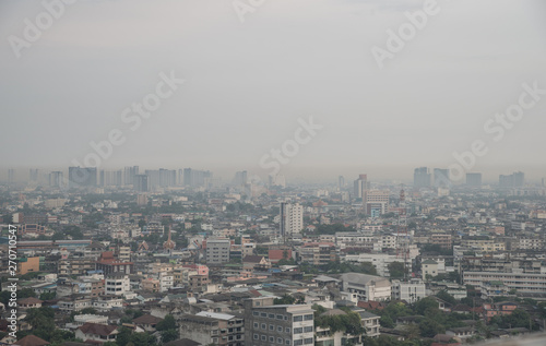 Cityscape of Bangkok the capital cities of Thailand covered by bad air pollution it is unhealthy. Pollution is a mixture of dust, dirt, soot and smoke.