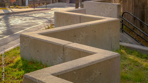 Panorama Outdoor stairs connected to a zig zag concrete barrier in Salt Lake City