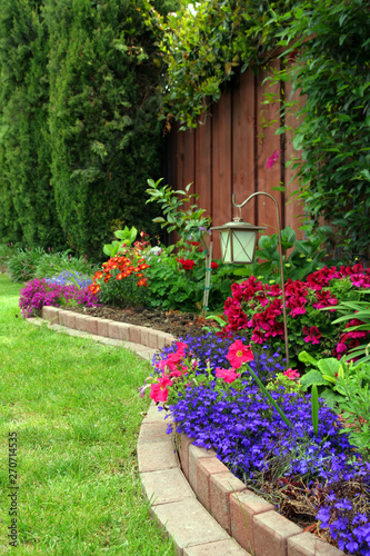 Landscaped yard with flower bed 
