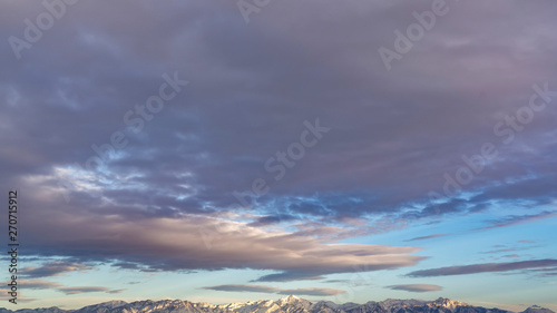 Panorama Panoramic view of a majestic mountain range covered with sharp white snow