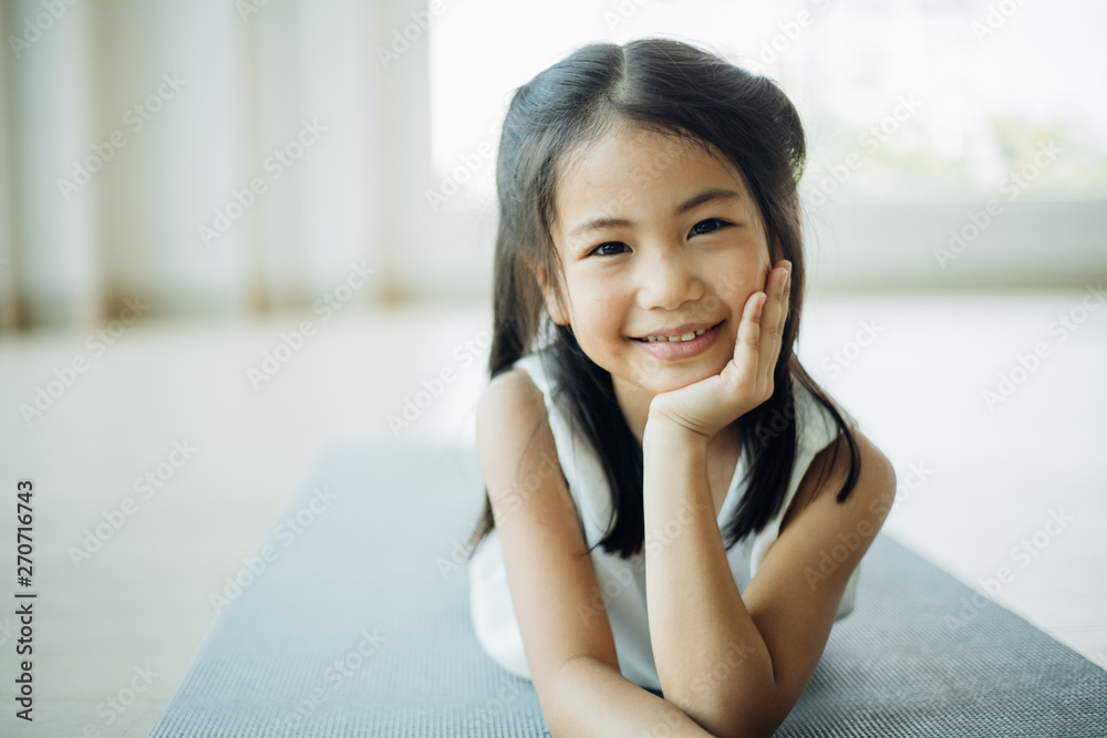 Portrait Asian little girl in living room smiling and happy Portrait Asian little girl in living room smiling and happy