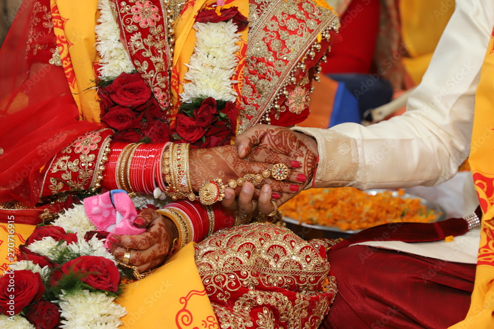 Indian Bride-Groom holding hand together 