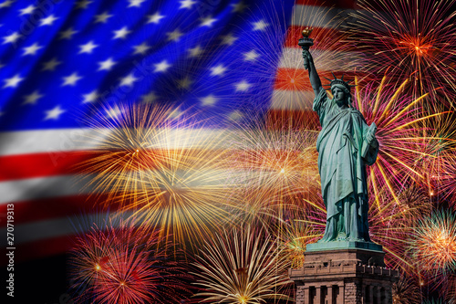 Statue of Liberty over the Multicolor Fireworks Celebrate with the United state of America USA flag background, 4th of July and Independence day concept photo