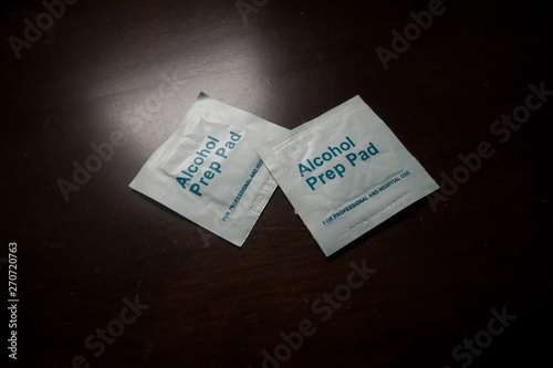 alcohol swab, isolated, used to sterilized skin area prior to injection or blood taking procedures