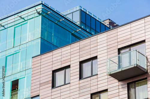 Modern hi-tech buildings in city. Business centre and hi-rise contrast