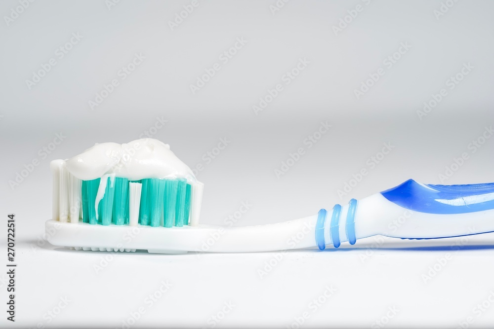 Toothbrush with toothpaste isolated on white background Toothbrush with toothpaste isolated on white background