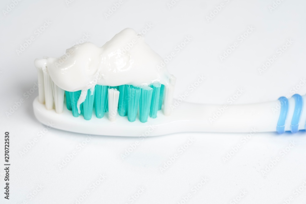 Toothbrush with toothpaste isolated on white background Toothbrush with toothpaste isolated on white background