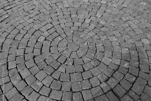 pavement of cobblestonesGray Pavement of cobblestones laid in concentric circles