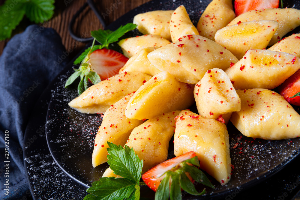 Kopytka - polish potato dumpling with strawberries Kopytka - polish potato dumpling with strawberries