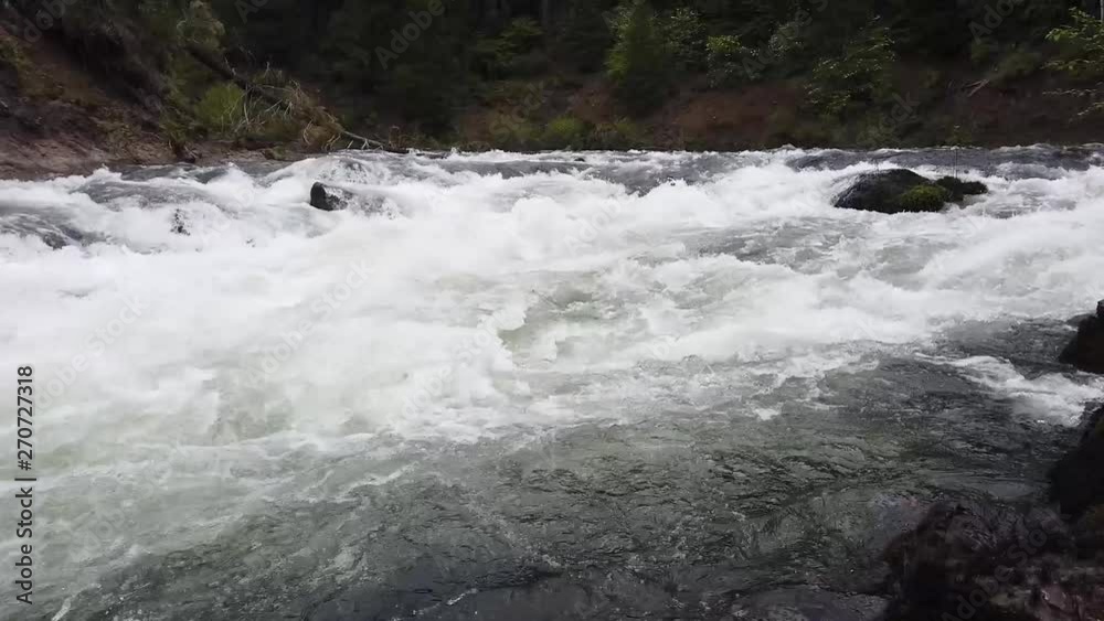 Rapids on the River Bridge section of water on the upper Rogue River in Southern Oregon Rapids on the River Bridge section of water on the upper Rogue River in Southern Oregon