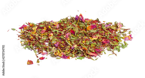 Green tea with dry flowers on white background. Close up
