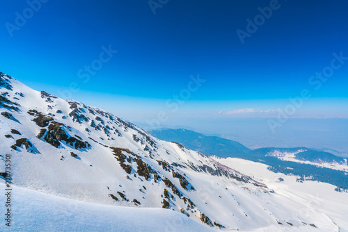 Beautiful  snow covered mountains landscape Kashmir state, India . © jannoon028