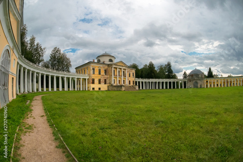 Architectural ensemble Manor Znamenskoye-Rayok. The manor house and the circular colonnade connecting it with the side wings (carriage and greenhouse) and the main gate opposite to it.