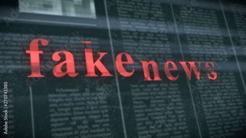 blurred newspaper on background with red text: 