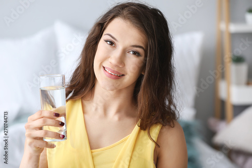 Beautiful young woman with ...