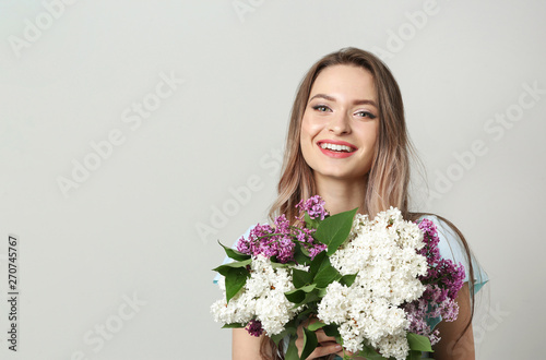 Beautiful young woman with ...