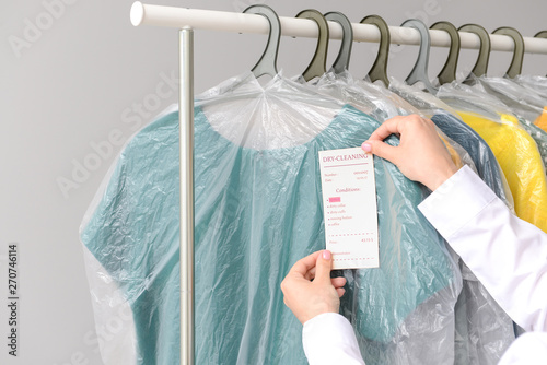Worker of dry-cleaner's app...