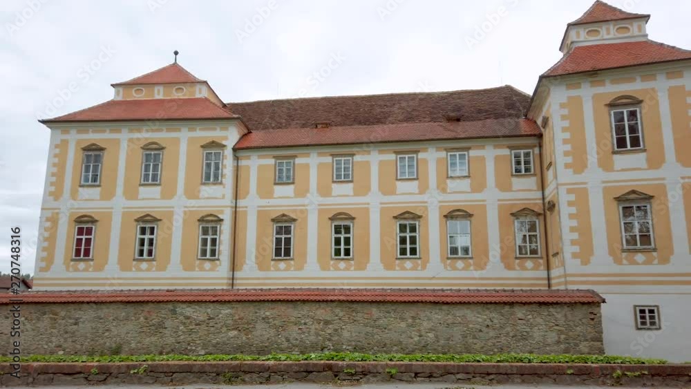 Renaissance Baroque palace in medieval European town, Castle in Slovenska Bistrica, Slovenia, panning shot of northern facade