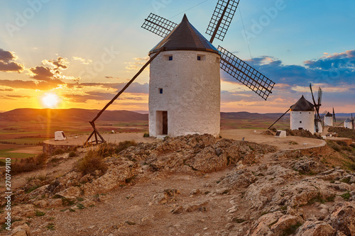 Traditional antique windmills at sunset in Spain. Consuegra, Toledo