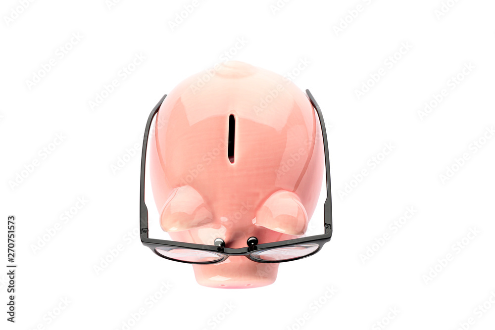 Happy piggy bank with glasses isolated on white background, top view. Finance, saving money Happy piggy bank with glasses isolated on white background, top view. Finance, saving money