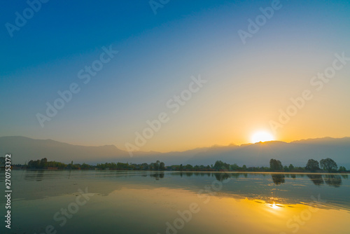 Sunrise on Dal lake, Kashmir India . © jannoon028