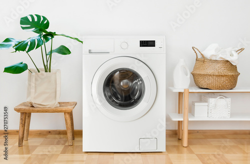 Canvas Print Clothes washing machine in laundry room interior