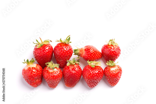 Strawberry creative pattern. Ripe red berry on white background