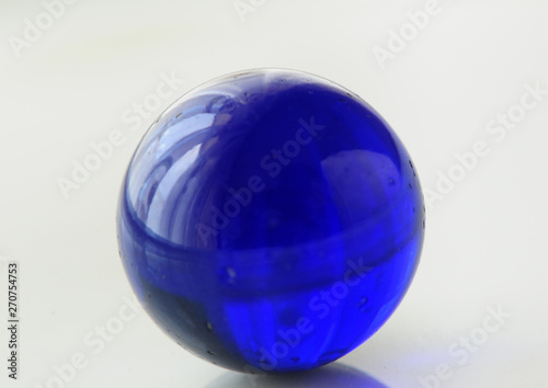blue glass ball isolated on white background