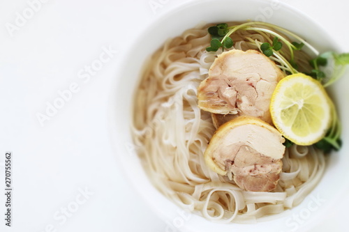 Vietnamese food, chciken and rice noodles with lemon photo