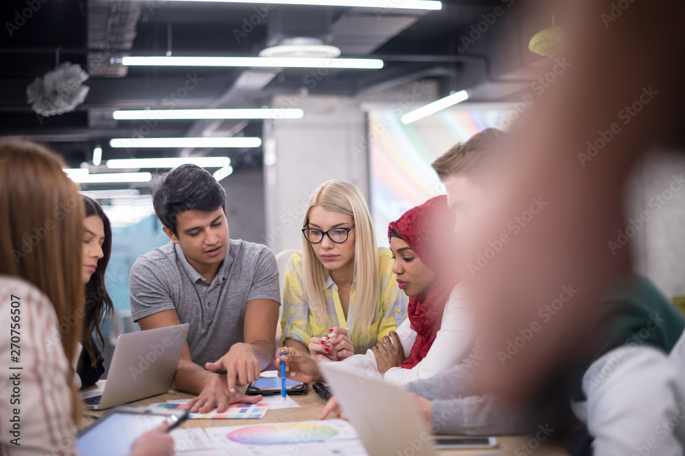 Multiethnic startup business team having meeting Multiethnic startup business team having meeting