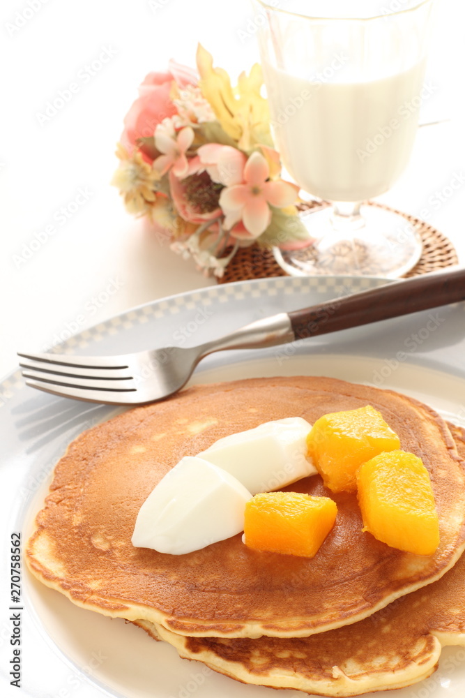 Frozen mango on panccake with copy space Frozen mango on panccake with copy space