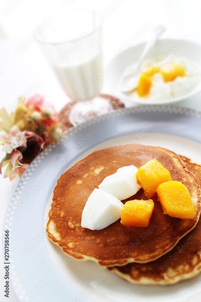 Frozen mango on panccake with copy space Frozen mango on panccake with copy space