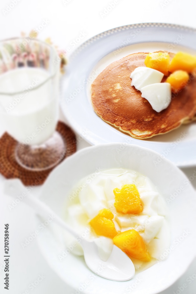 Peach and yogurt on bowl Peach and yogurt on bowl