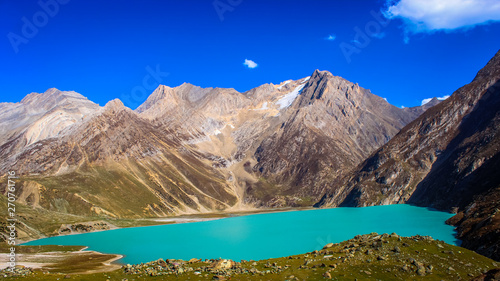 Deep green water of Sheshnag Lake in the vicinity of Amarnath Cave in Kashmir.