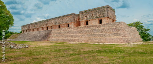Overview of a Mayan Temple with its high entrance stairs, in the archaeological area of Uxmal, in the Yucatan Peninsula