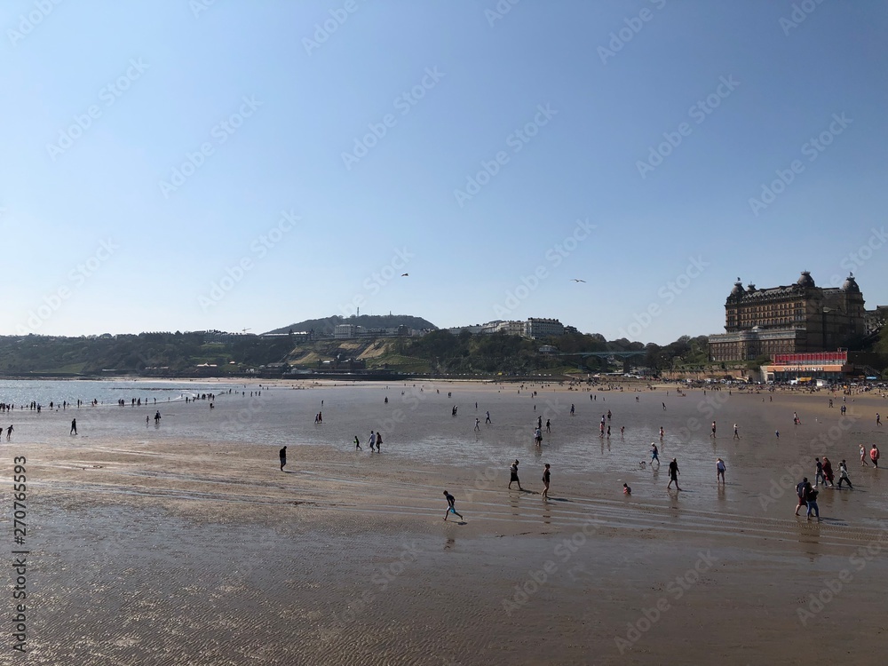 Low tide on South Bay beach in Scarborough, UK Low tide on South Bay beach in Scarborough, UK