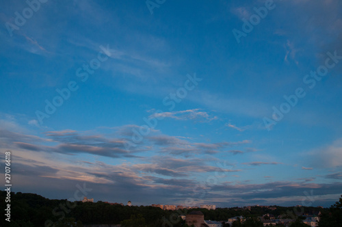 blue evening sky. Summer evening. Sunset red clouds © amdre100