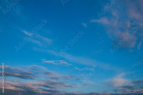 blue evening sky. Summer evening. Sunset red clouds © amdre100