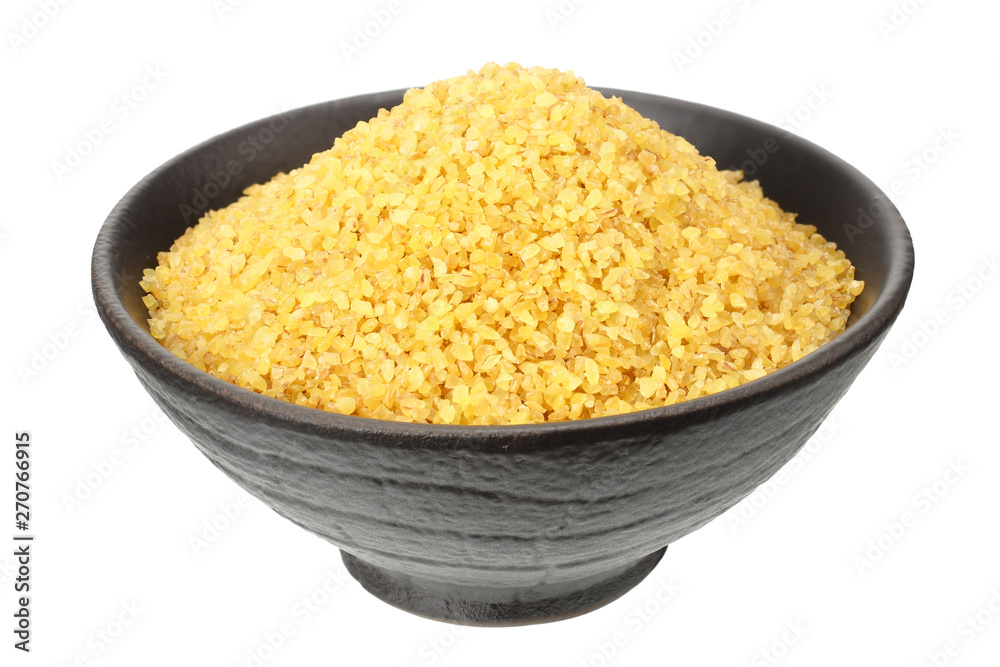 dry bulgur wheat in bowl isolated on white background dry bulgur wheat in bowl isolated on white background