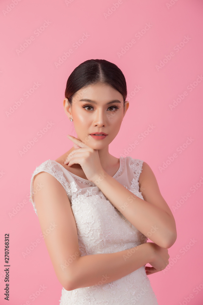 Beautiful asian bride portrait in pink studio Beautiful asian bride portrait in pink studio