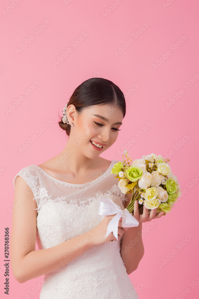 Beautiful asian bride portrait in pink studio Beautiful asian bride portrait in pink studio