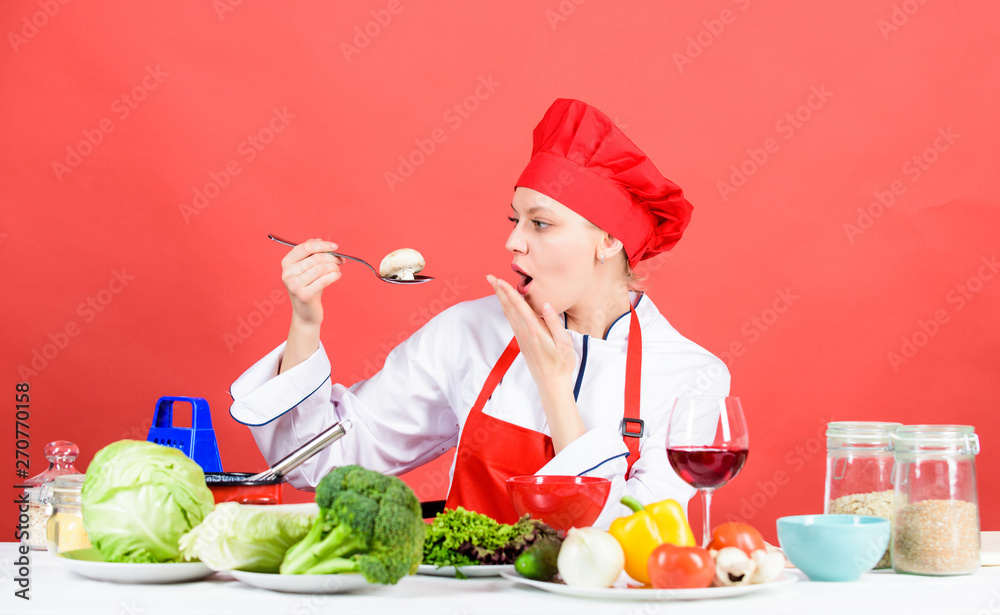 Girl at kitchen table. Cooking food and housekeeping. Housewife routine. Professional cooking tips. Woman chef try taste eat food. Delicious recipe concept. Cooking meal. Cooking healthy food Girl at kitchen table. Cooking food and housekeeping. Housewife routine. Professional cooking tips. Woman chef try taste eat food. Delicious recipe concept. Cooking meal. Cooking healthy food