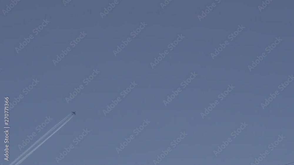 Big commercial aircraft is crossing the sky in a highest flight altitude Big commercial aircraft is crossing the sky in a highest flight altitude