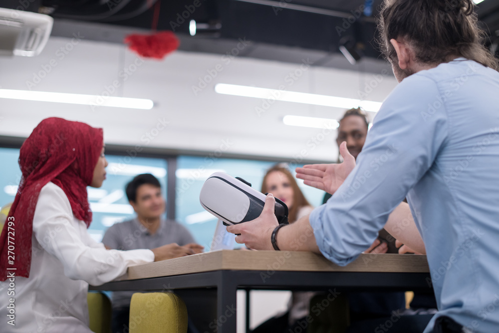 Young Multiethnic Business team using virtual reality headset Young Multiethnic Business team using virtual reality headset