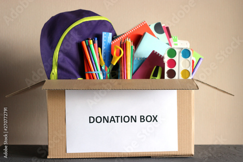 donation box with school stationery items