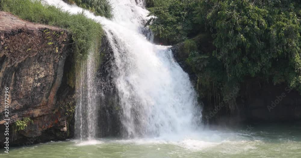Beautiful waterfalls in Vietnam in the wild. slow motion. Asian nature. UHD video Beautiful waterfalls in Vietnam in the wild. slow motion. Asian nature. UHD video