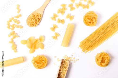 Cuadro en lienzo Different types of pasta on a white background top view.