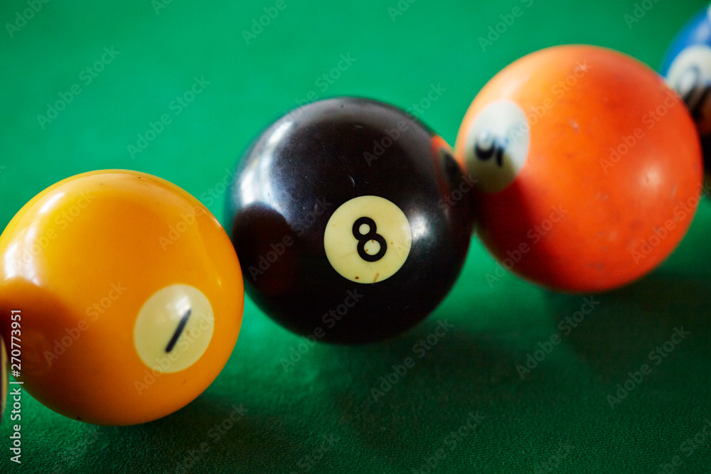 Billiards balls on green table Billiards balls on green table