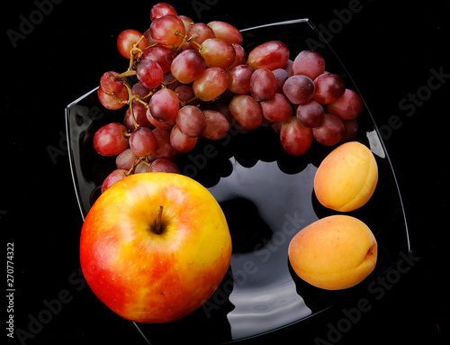 Grape ,apple  and appricots  - vegan and vegetarian food photo