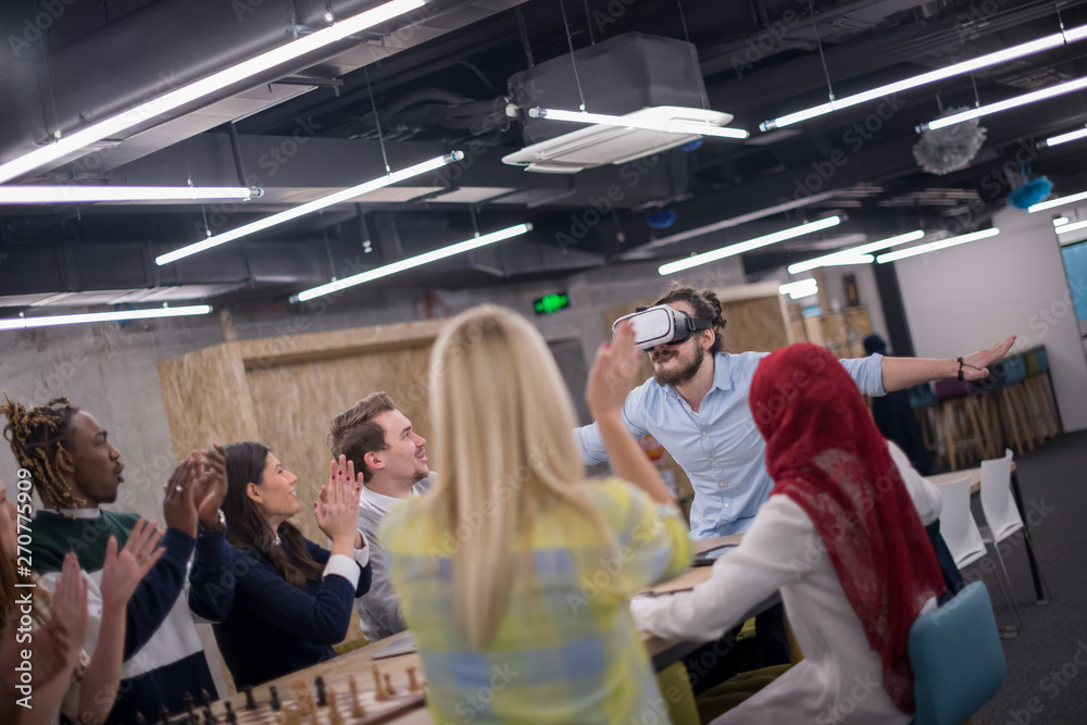 Young Multiethnic Business team using virtual reality headset Young Multiethnic Business team using virtual reality headset
